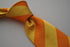 orange and yellow barber striped tie